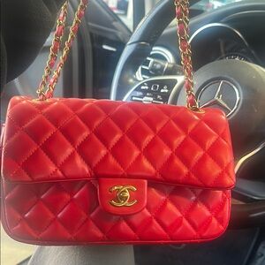 C H A n E L. Red Quilted Shoulder Bag with Gold Accents
